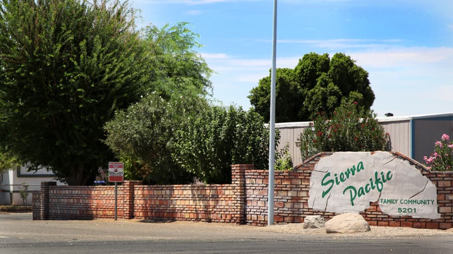 The Sierra Pacific Family Community entrance sign on Highway 95