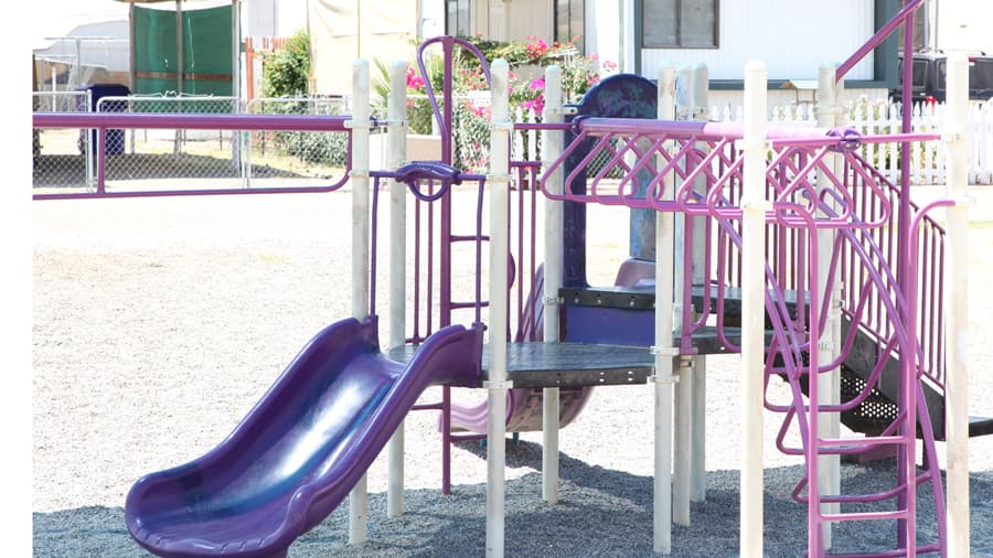 The playset at Sierra Pacific, with slides and climbing frames.